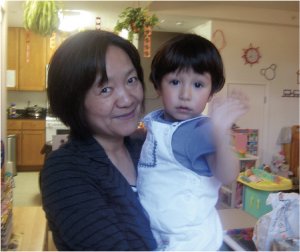 Photo: Linus, almost two-years-old, happy in Su's arms right before Lu went into the delivery room for Dashel.