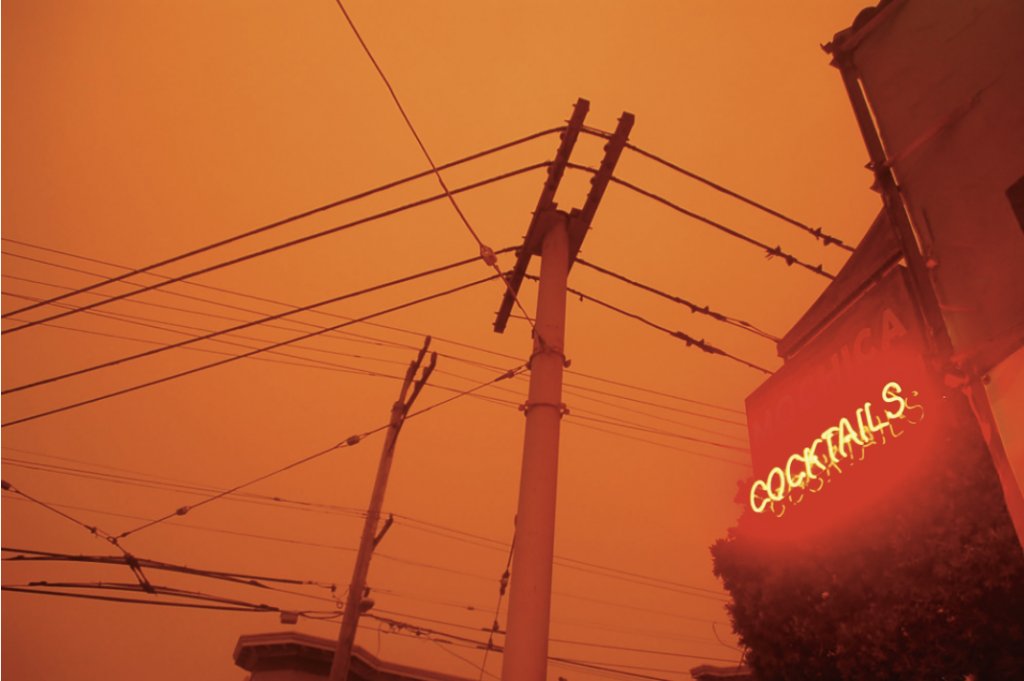 A blanket of wildfire smoke darkened skies, as seen at the corner of 18th and Connecticut streets. September 9, 2020, 9 a.m. Photo: Carmen Herraiz