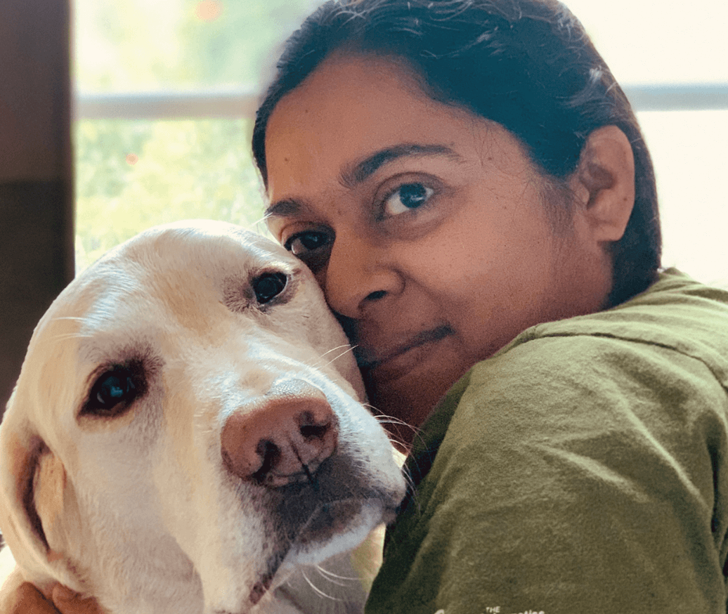 Sam Krishnan, a volunteer at Muttville, and Snowy, the senior dog she recently adopted. Photo: Jessica Zimmer